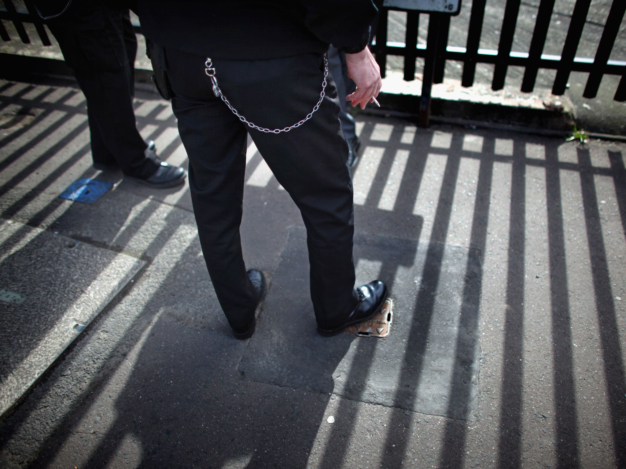 A prison officer stands outside Birmingham Prison in Winson Green Prison, Birmingham, which is one of three to be selected for privatisation on March 31, 2011 in Birmingham, England.
