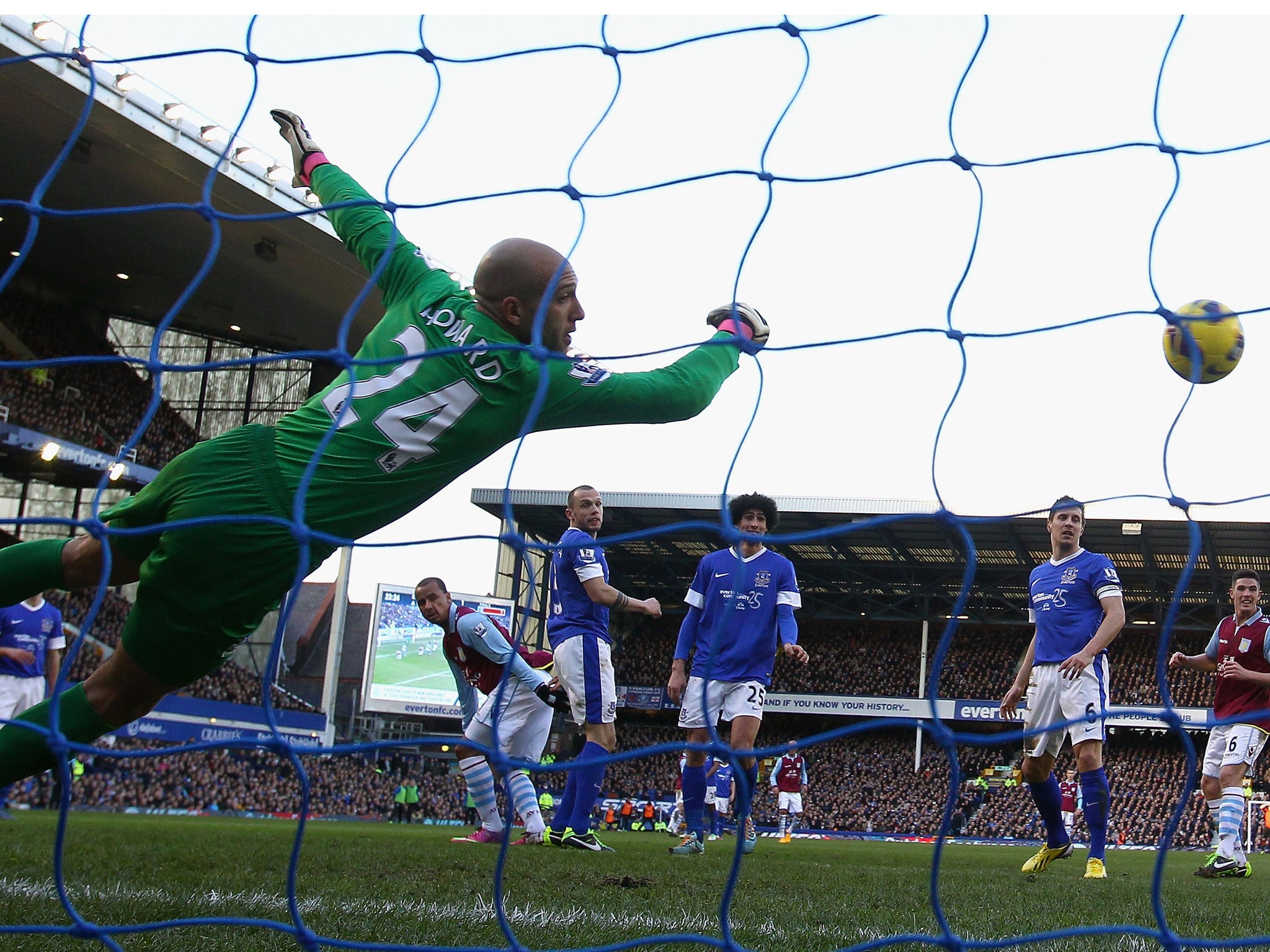 Gabriel Agbonlahor of Aston Villa scores the second goal past Everton keeper Tim Howard