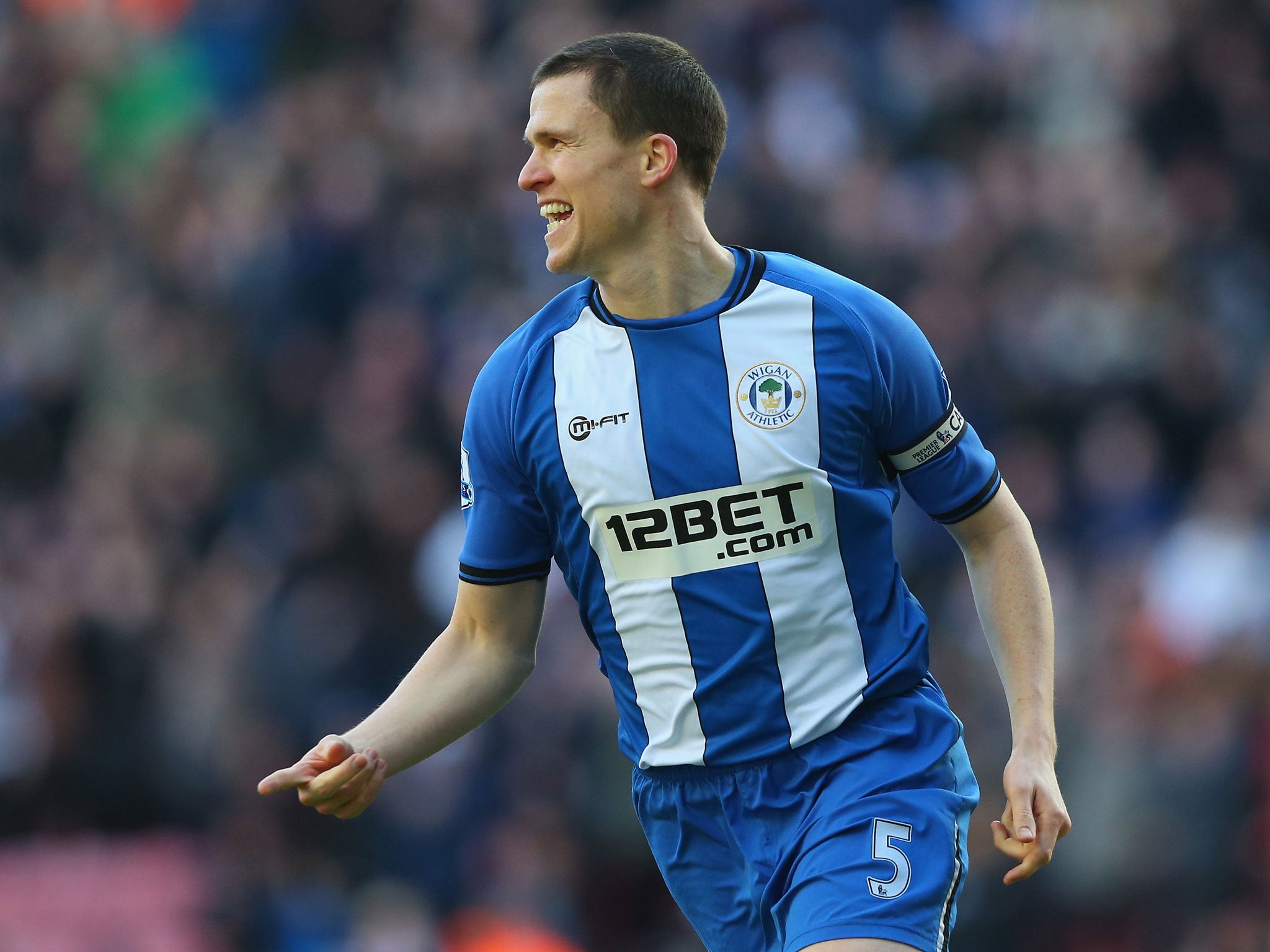 Gary Caldwell of Wigan Athletic celebrates after scoring the opening goal