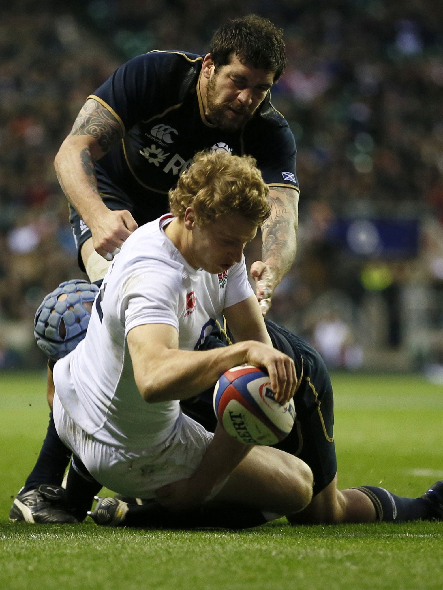 Billy whizz: Billy Twelvetrees crosses the line for the second of England’s four tries to cap an impressive debut