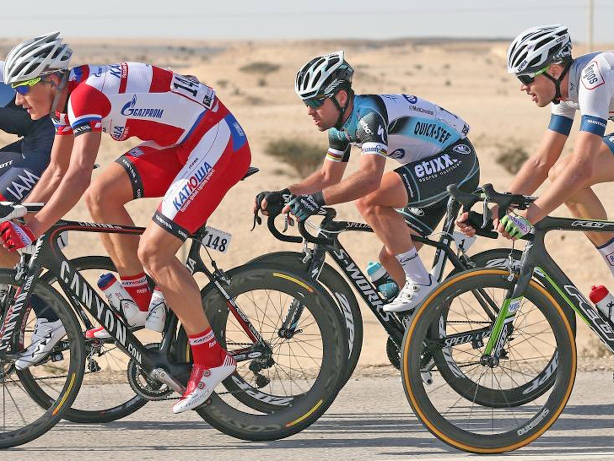 Mark Cavendish (centre) in action during stage one of the Tour of Qatar