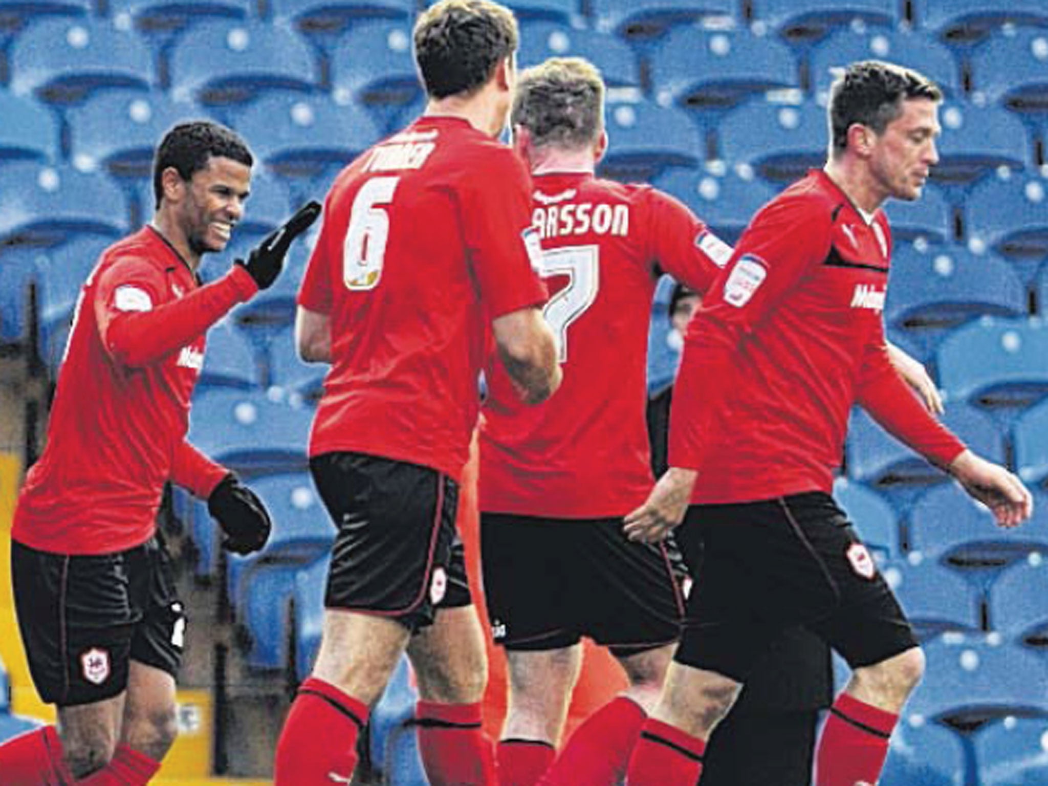 Fraizer Campbell (left) enjoyed a goalscoring debut for Cardiff against Leeds on Saturday