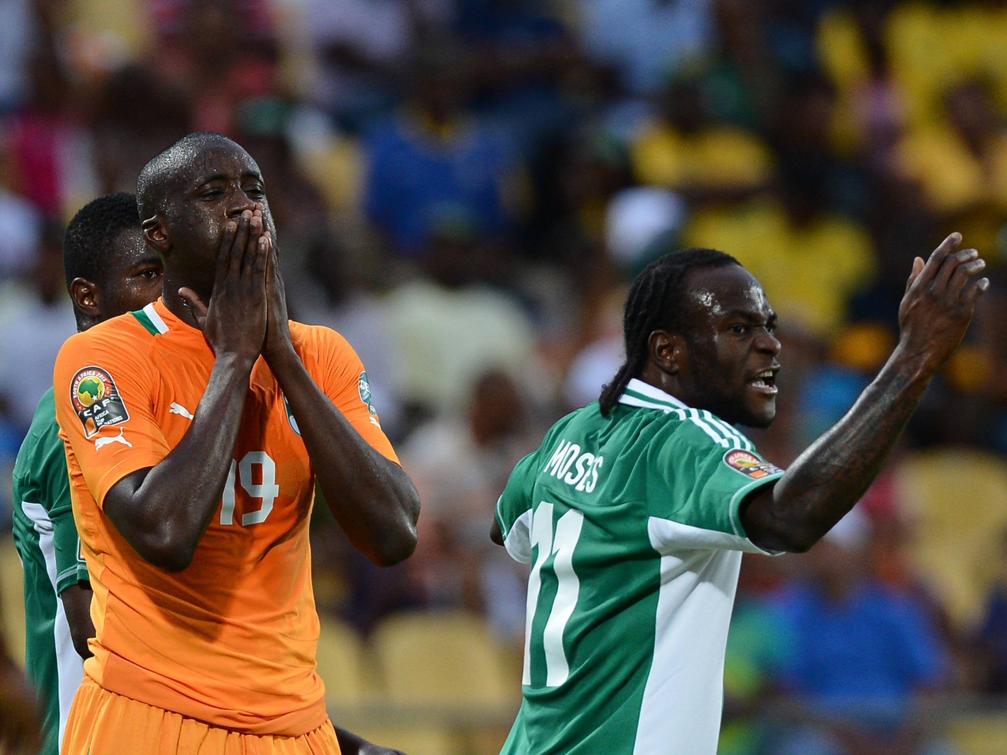 Ivory Coast midfielder Yaya Toure reacts after missing a goal opportunity during defeat in the African Cup of Nation quarter-final against Nigeria