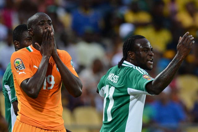 Ivory Coast midfielder Yaya Toure reacts after missing a goal opportunity during defeat in the African Cup of Nation quarter-final against Nigeria