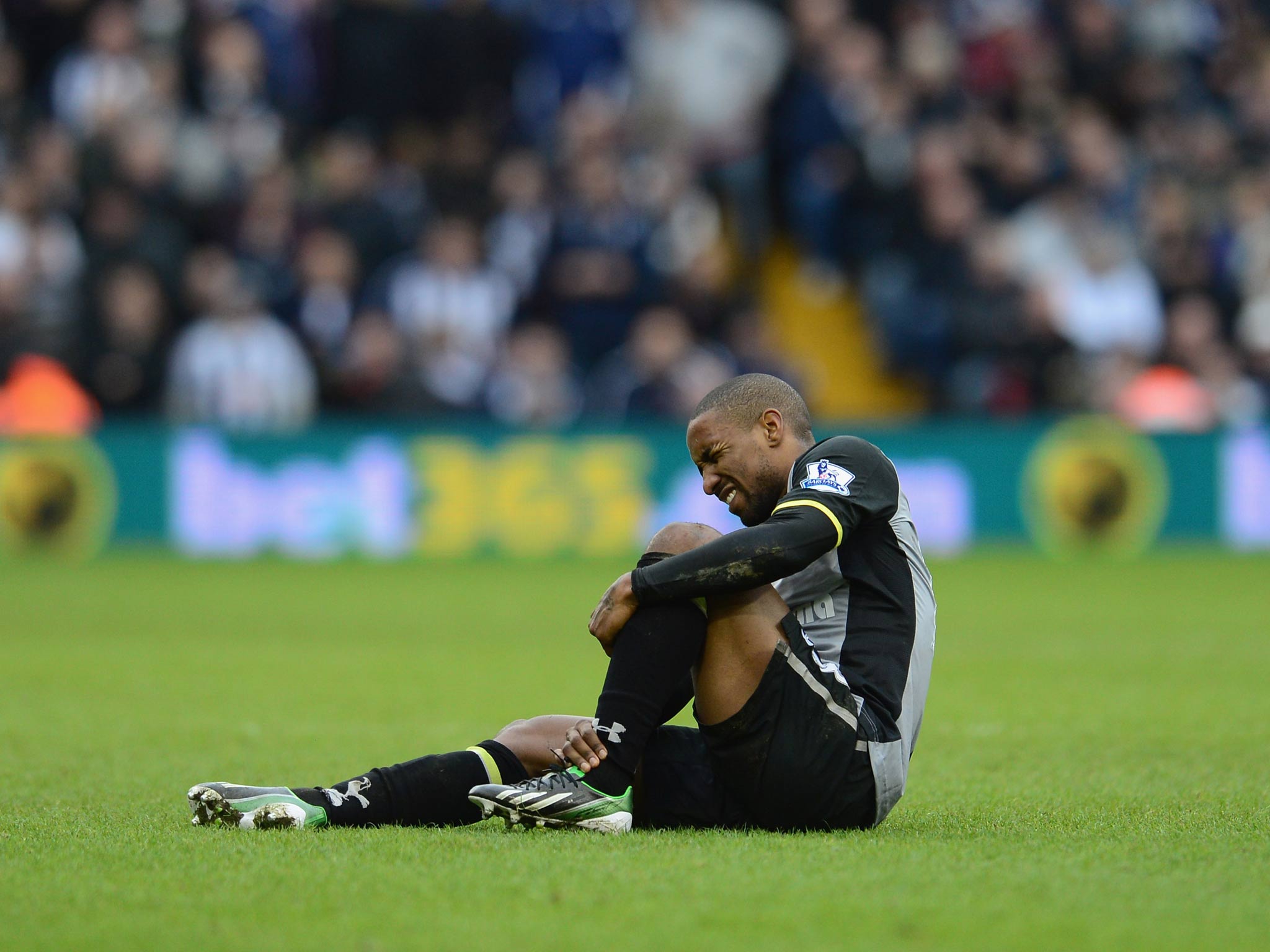 Tottenham striker Jermain Defoe picks up an injury in the Premier League match against West Brom
