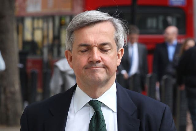 Energy Secretary Chris Huhne arrives at The Cabinet Office entrance for a Cabinet meeting on May 17, 2011 in London, England.