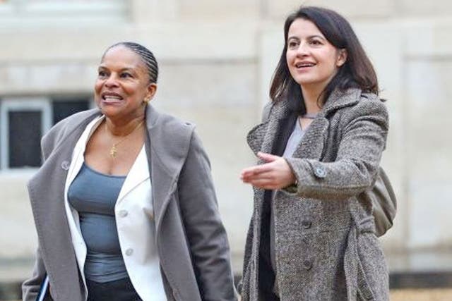 French ministers Cecile Duflot, right, and Christiane Taubira at the Elysee Palace on Sunday – in trousers