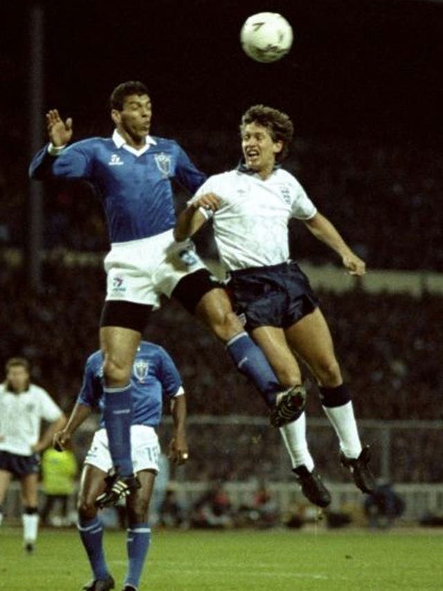 Gary Lineker challenges Brazil’s Carlos Mozer for the ball