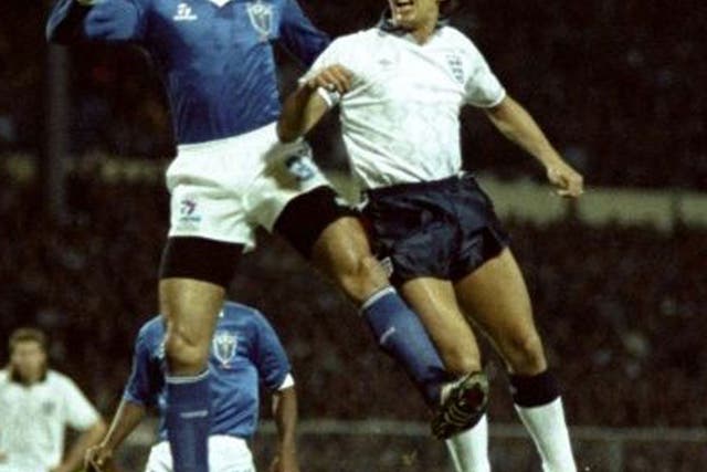 Gary Lineker challenges Brazil’s Carlos Mozer for the ball