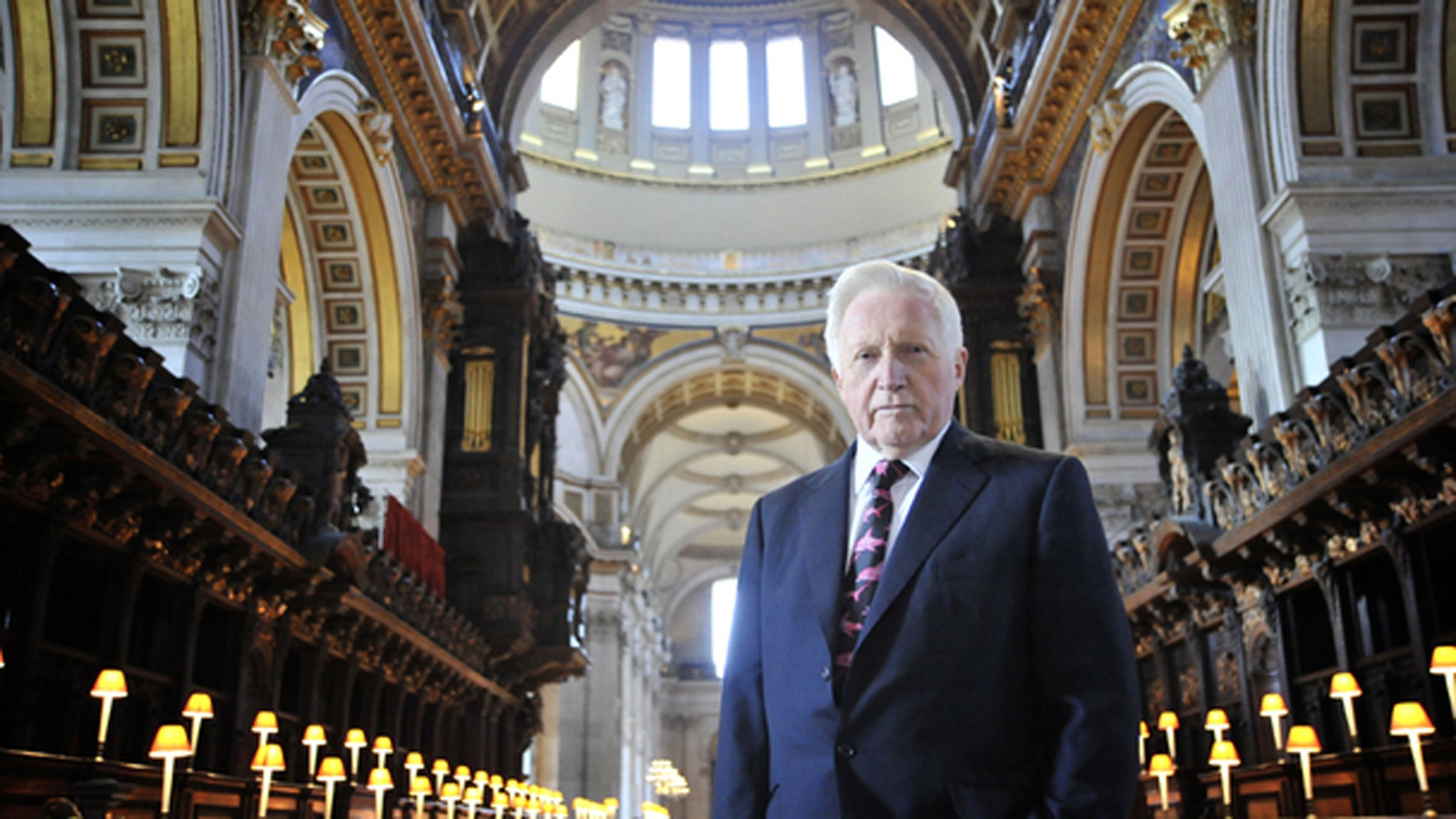 David Dimbleby standing under the arch in St Paul's Cathedral, where Question Time is due to be filmed for the first time