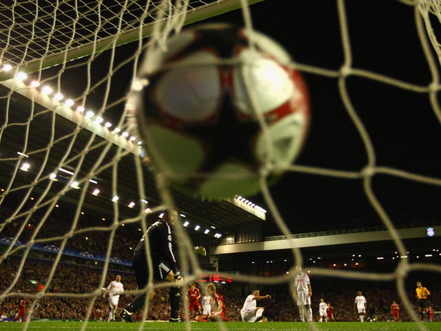 Dirk Kuyt scores the only goal of the match during Liverpool's Champions League match against Debrecen in 2009