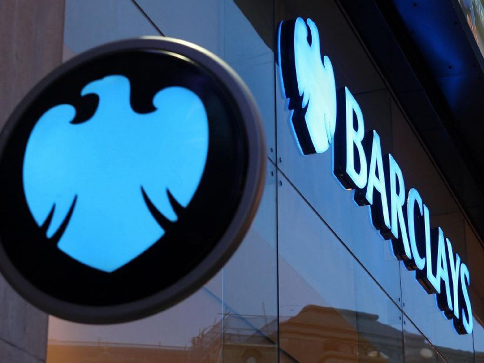 Scandal-hit banking giant Barclays today said it was axing at least 3,700 jobs under a strategic overhaul, but revealed it was paying £1.85 billion in bonuses to staff