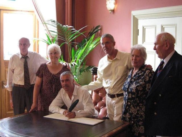 Lance Price and his partner James celebrate their civil partnership in 2008, surrounded by friends and family.