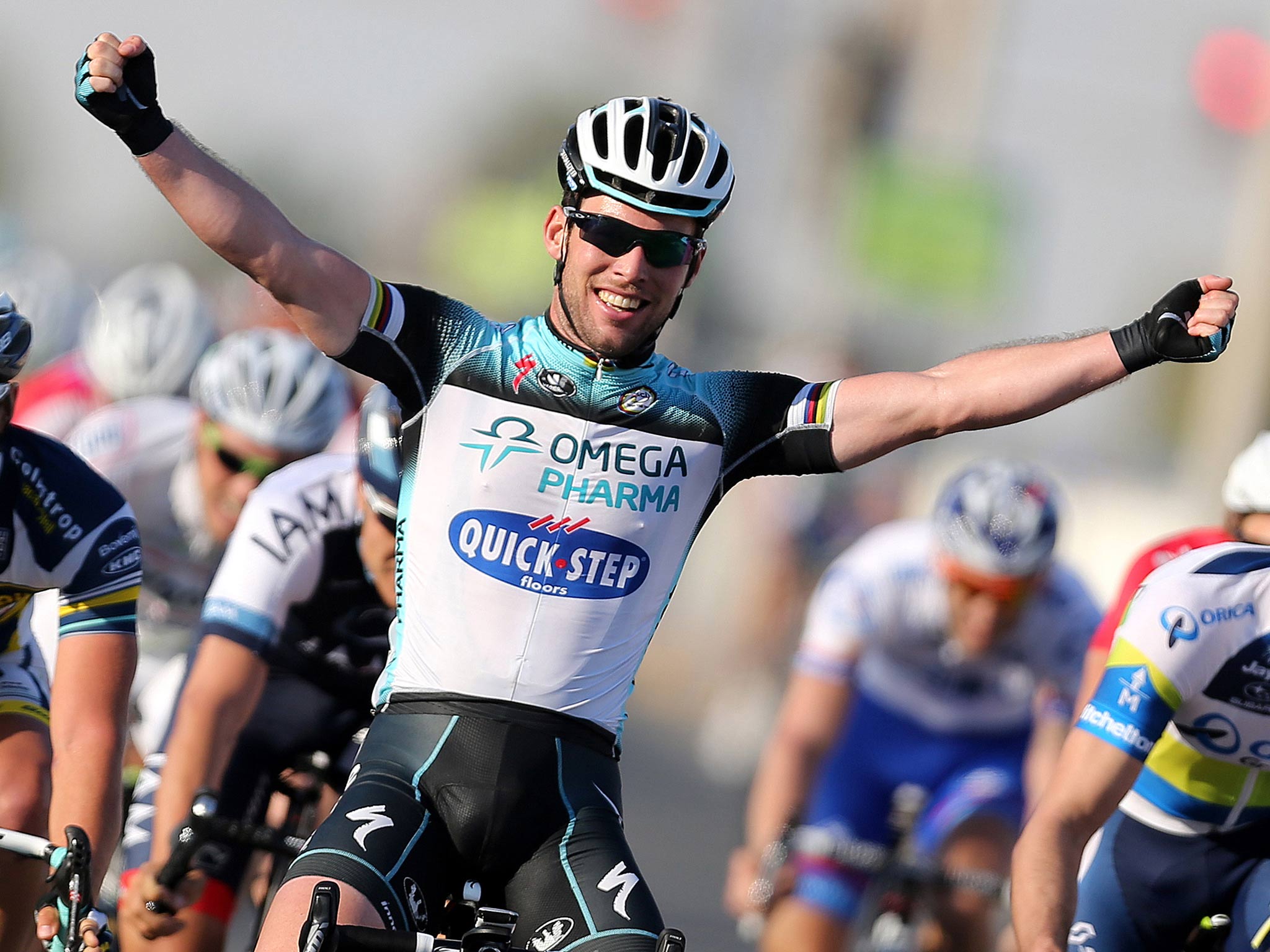 Mark Cavendish celebrates winning the third stage of the Tour of Qatar
