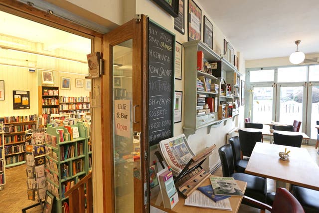 A literary feast: Café Also looks like a canteen of a serious seat of learning, with Quakerish tables, leather chairs and a long bookshelf in distressed, green-painted wood
