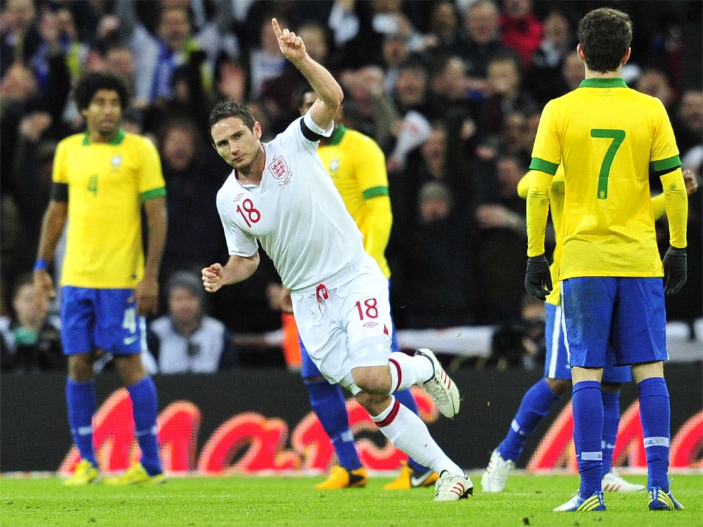 Frank Lampard celebrates England's winner against Brazil