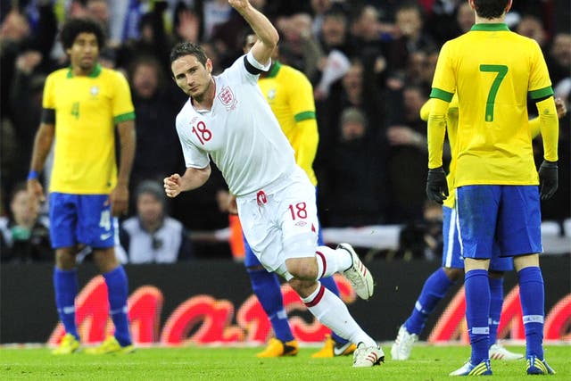 Frank Lampard celebrates England's winner against Brazil