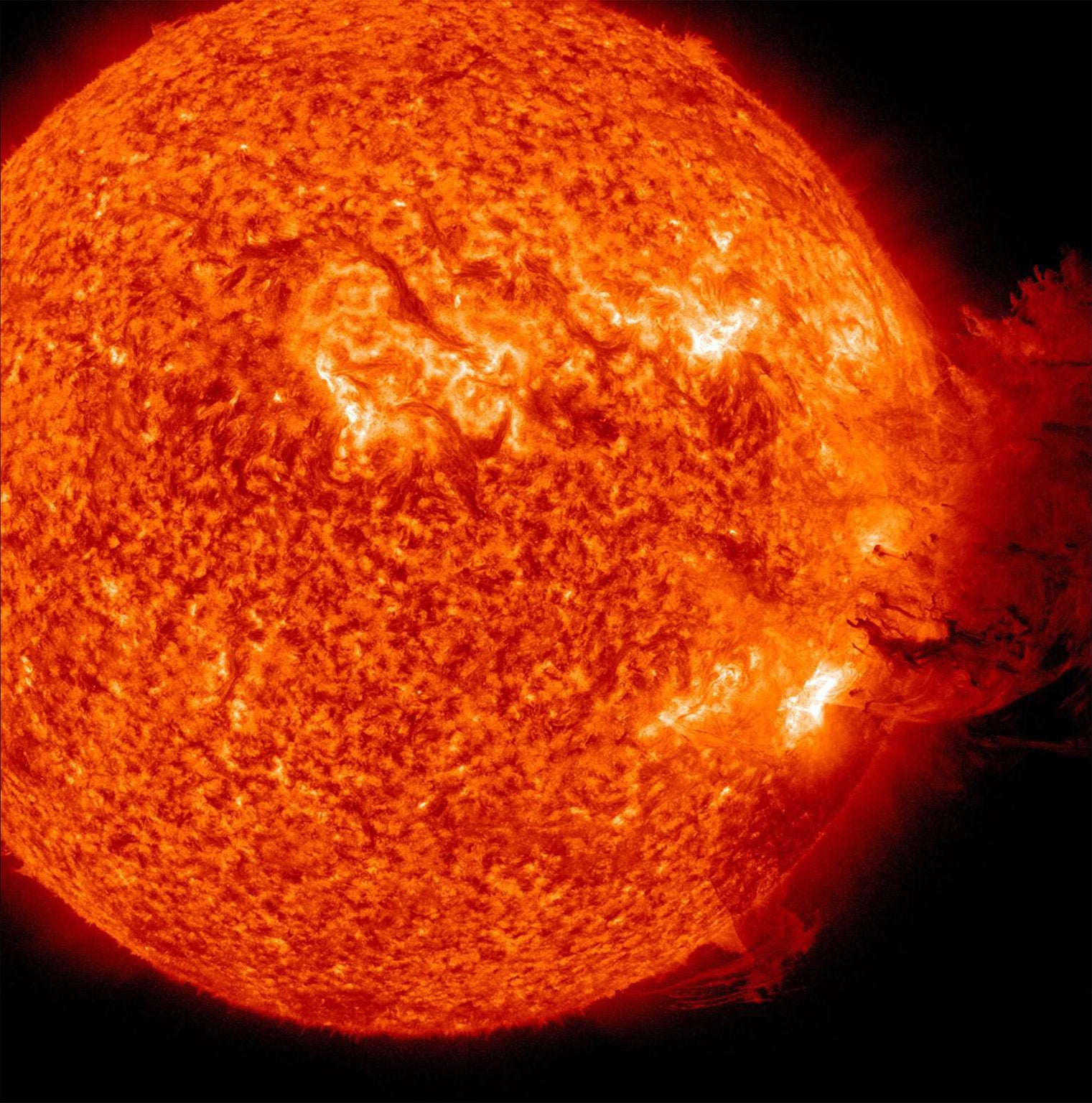 This image NASA provided image taken last June shows the Sun unleashing a solar flare, a minor radiation storm and a spectacular coronal mass ejection