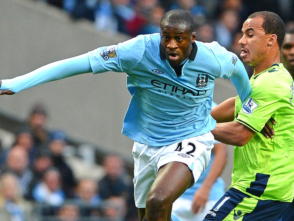 Manchester City's Yaya Toure is reported to earn around £200,000 a week