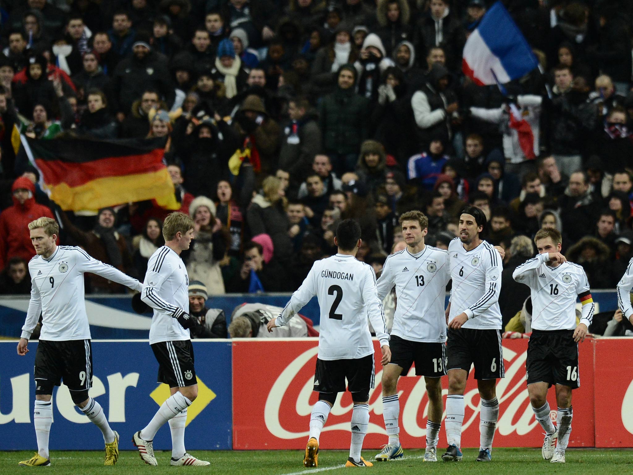 Sami Khedira is congratulated after scoring the winning goal against France