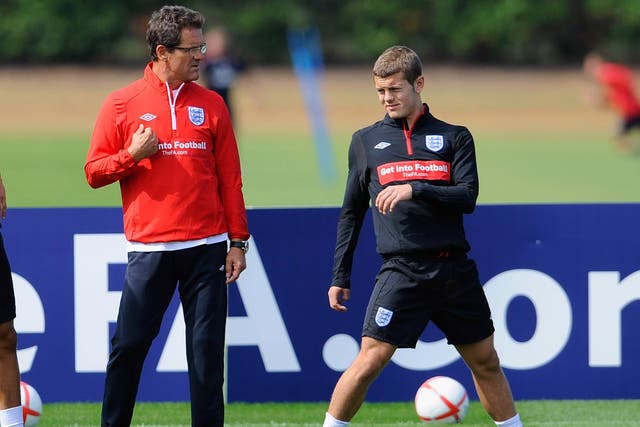 Jack Wilshere pictured training under the gaze of Fabio Capello in 2010