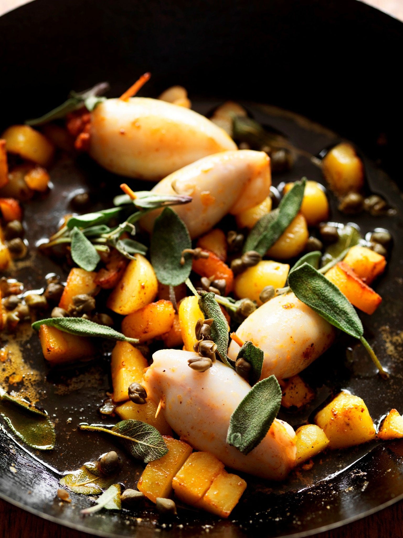 Chorizo-stuffed squid with potatoes, capers and sage by Ben Tish
