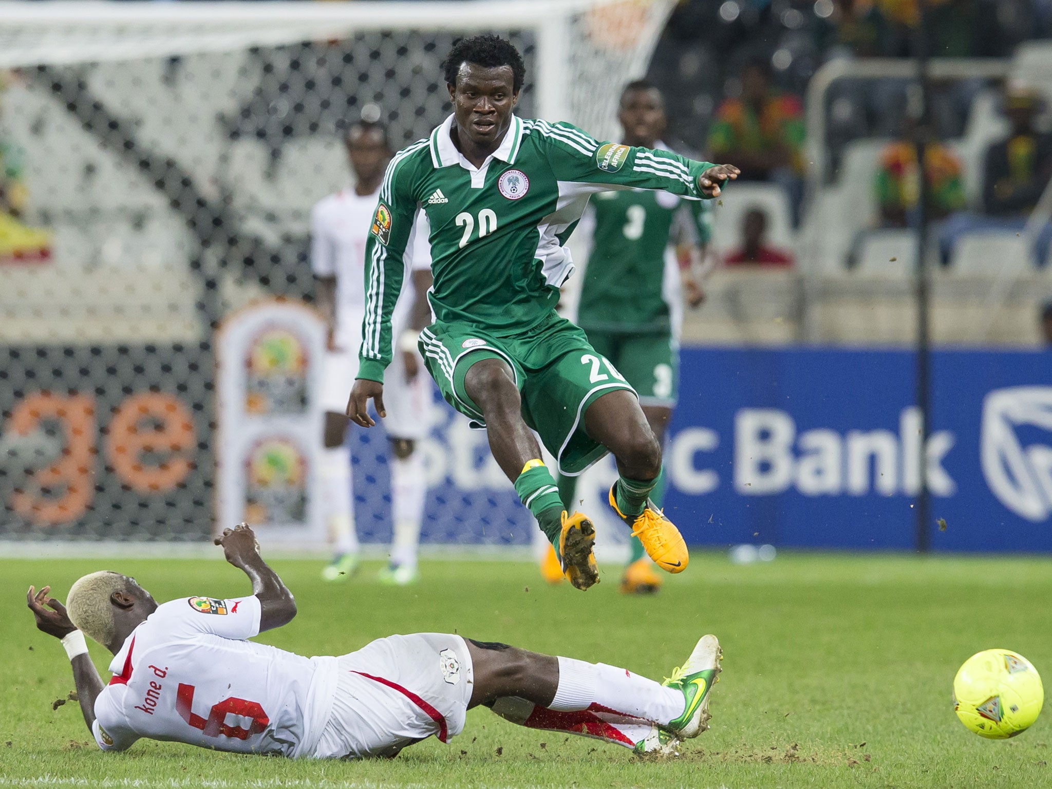 Igiebor Nosakhare Emmanuel and Djakaridja Kone during the 2013 Orange African Cup of Nations match between Nigeria and Burkina Faso