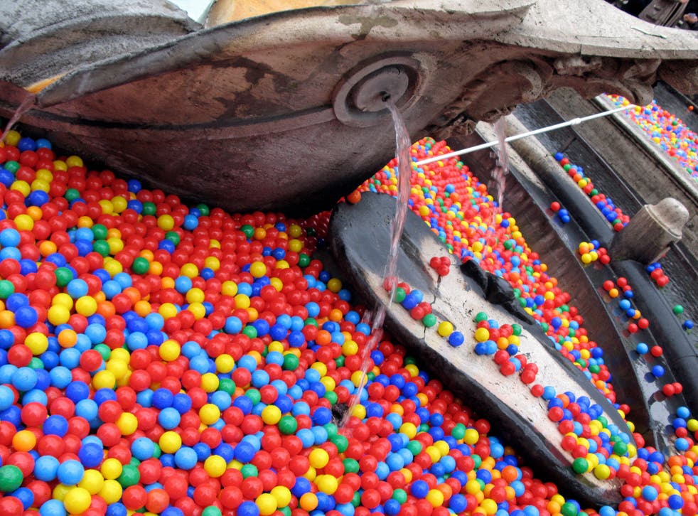 Graziano Cecchini unleashed colourful balls into Rome's Trevi Fountain