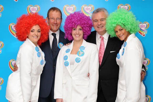 Richard Desmond launching the Health Lottery with TV presenter Eamonn Holmes