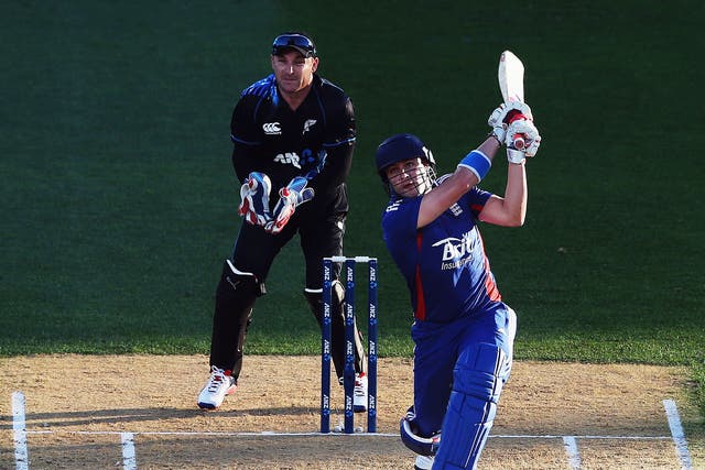 Luke Wright hits the ball away for six runs during the 1st T20 International between New Zealand and England at Eden Park