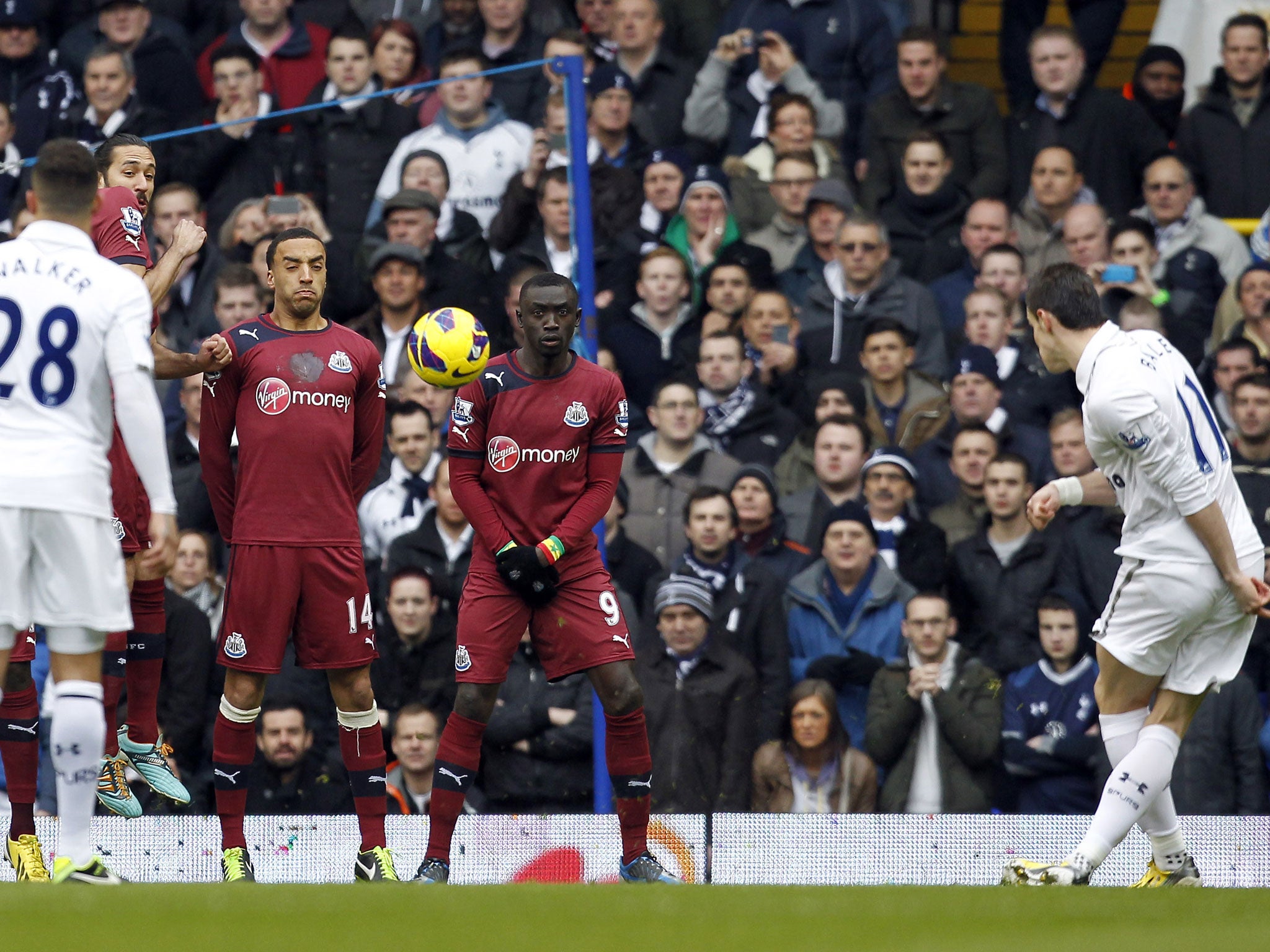 Gareth Bale scores his opening goal from a freekick