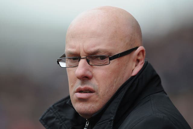 Brian McDermott looks on as his Reading side look set for relegation