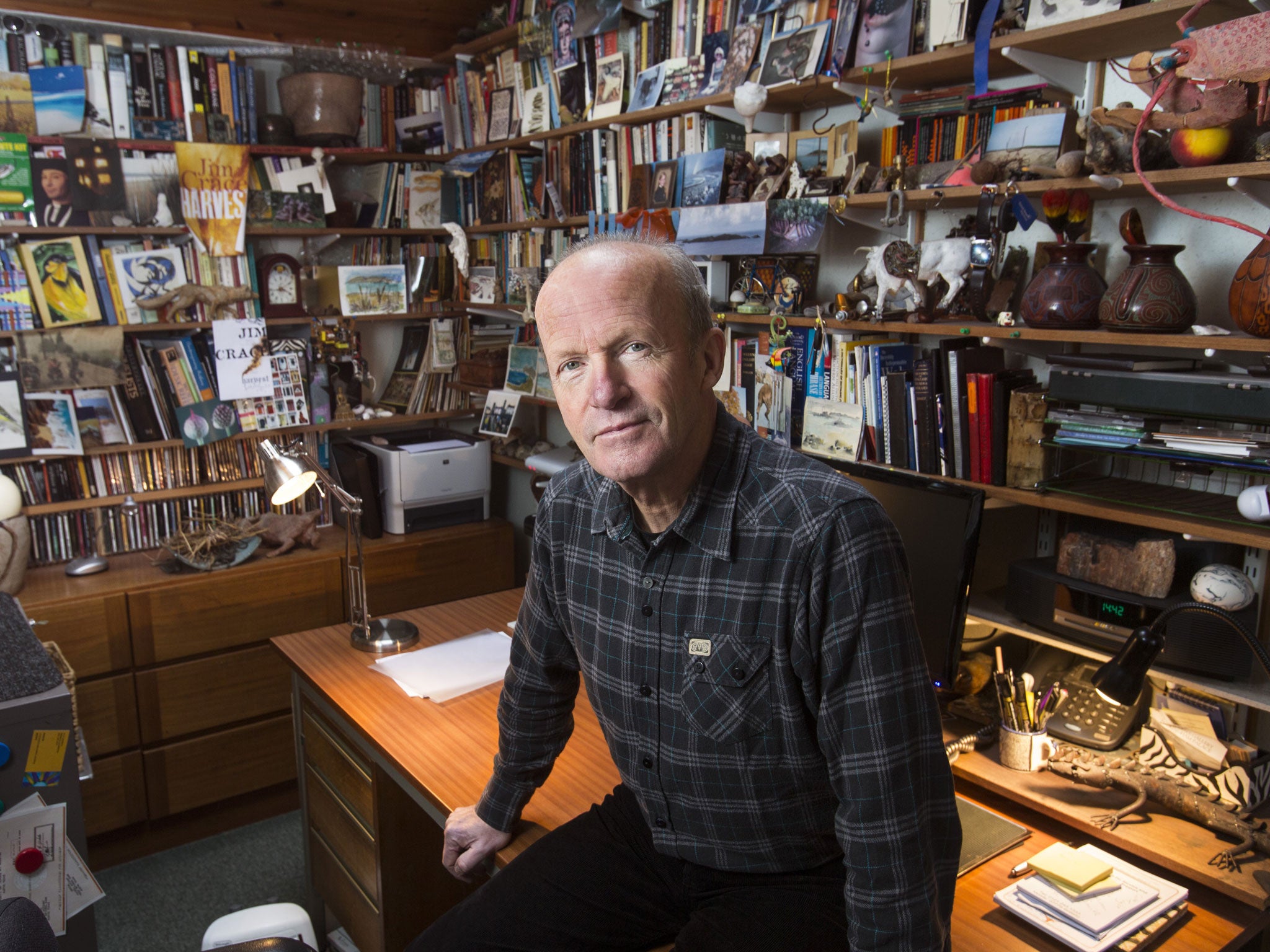 Writer’s den: Jim Crace with the geckos, twigs, and fossils in his study