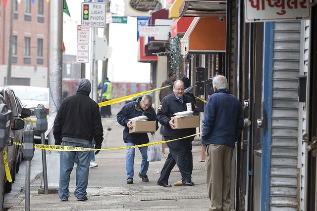 On the case: FBI agents investigate a jewellers in Jersey City