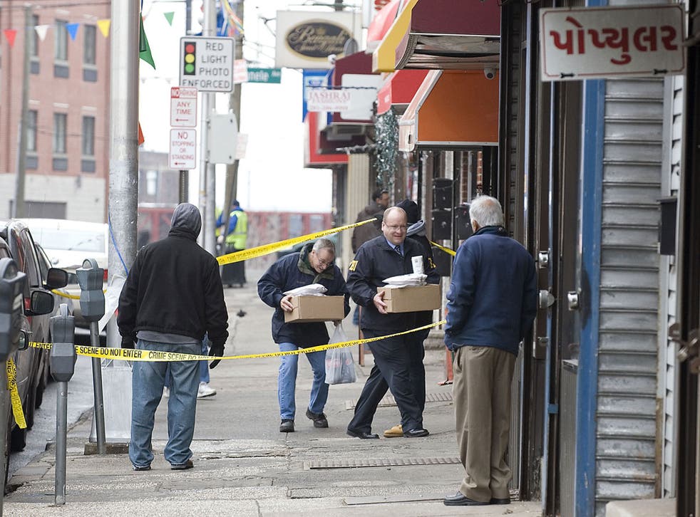 On the case: FBI agents investigate a jewellers in Jersey City