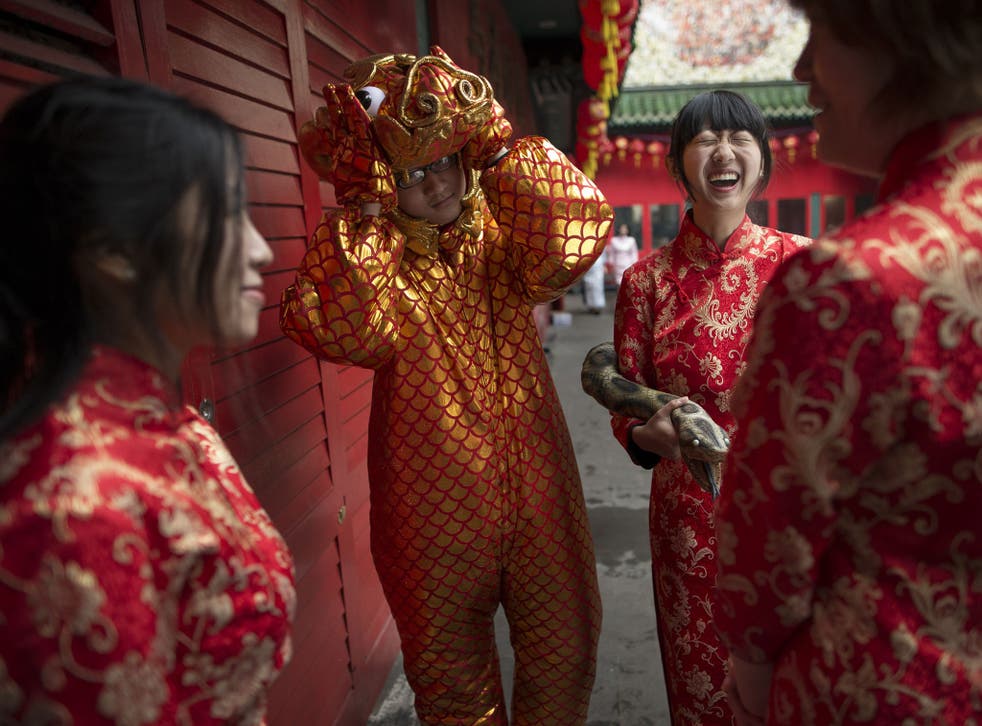 Performers are seen during preparations for Chinese New Year in Chinatown