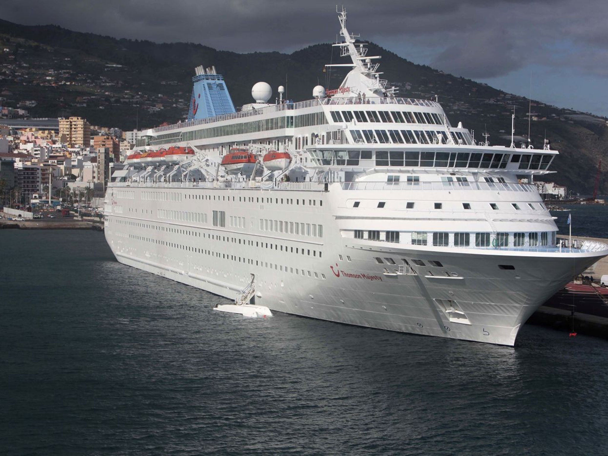 A lifeboat remains in the sea after falling from the cruise liner and killing 5 people during a safety drill