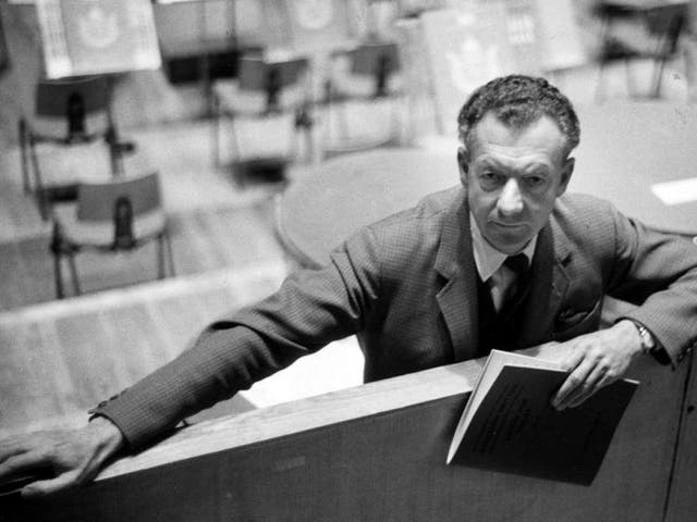 Benjamin Britten at the Royal Festival Hall, London, holding the score of his cantata 'Voices For Today'