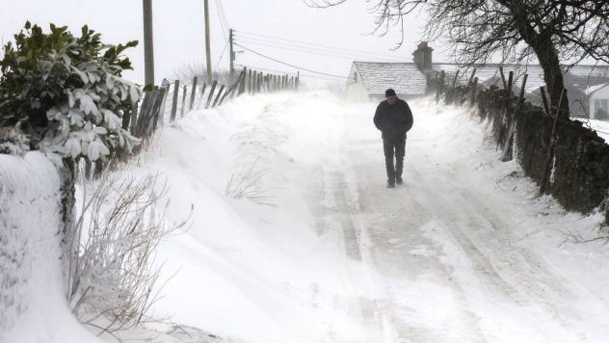 A man walks down a lane near Nenthead, on the Northumberland and Cumbria border