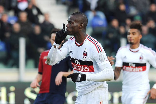 Mario Balotelli of AC Milan celebrates his goal scored from the penalty spot during the Serie A match between Cagliari Calcio and AC Milan at Stadio Is Arenas