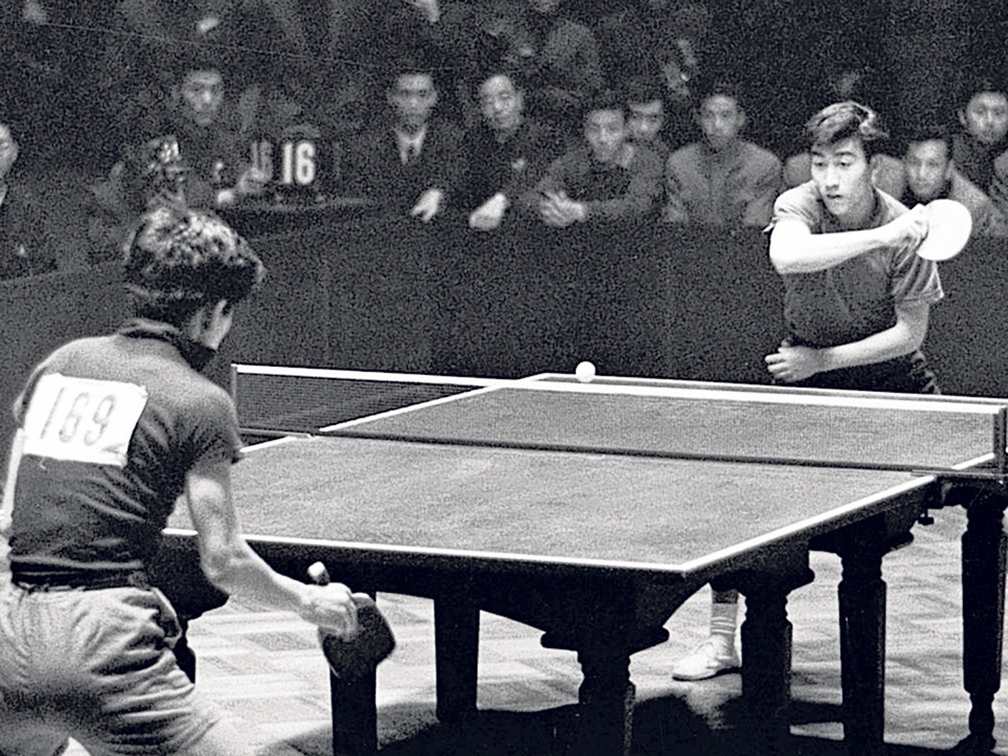 Zhuang, right, on his way to winning the 1961 World Table Tennis Championships in Beijing