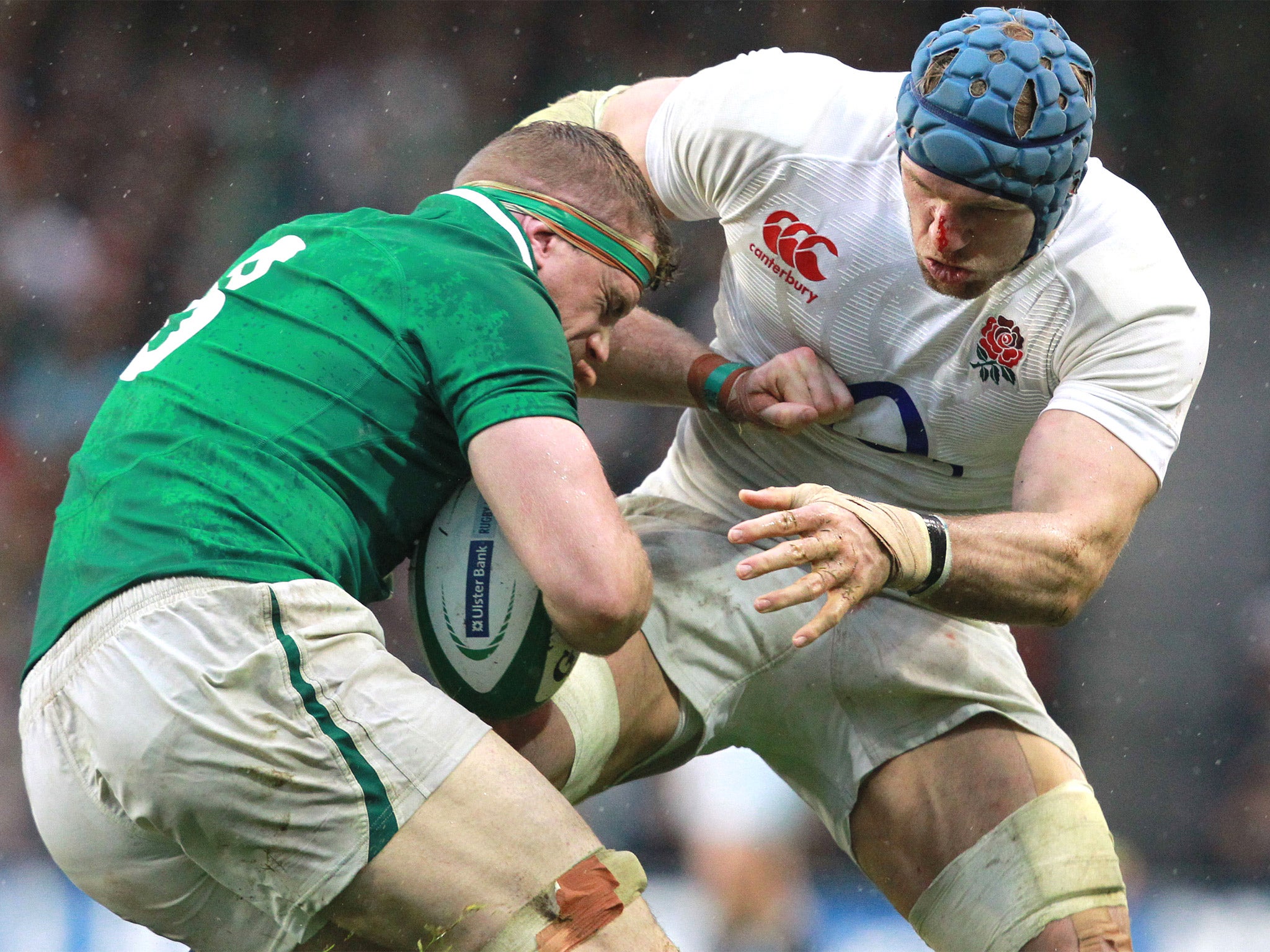 England’s James Haskell tackles Ireland’s Jamie Heaslip last Sunday