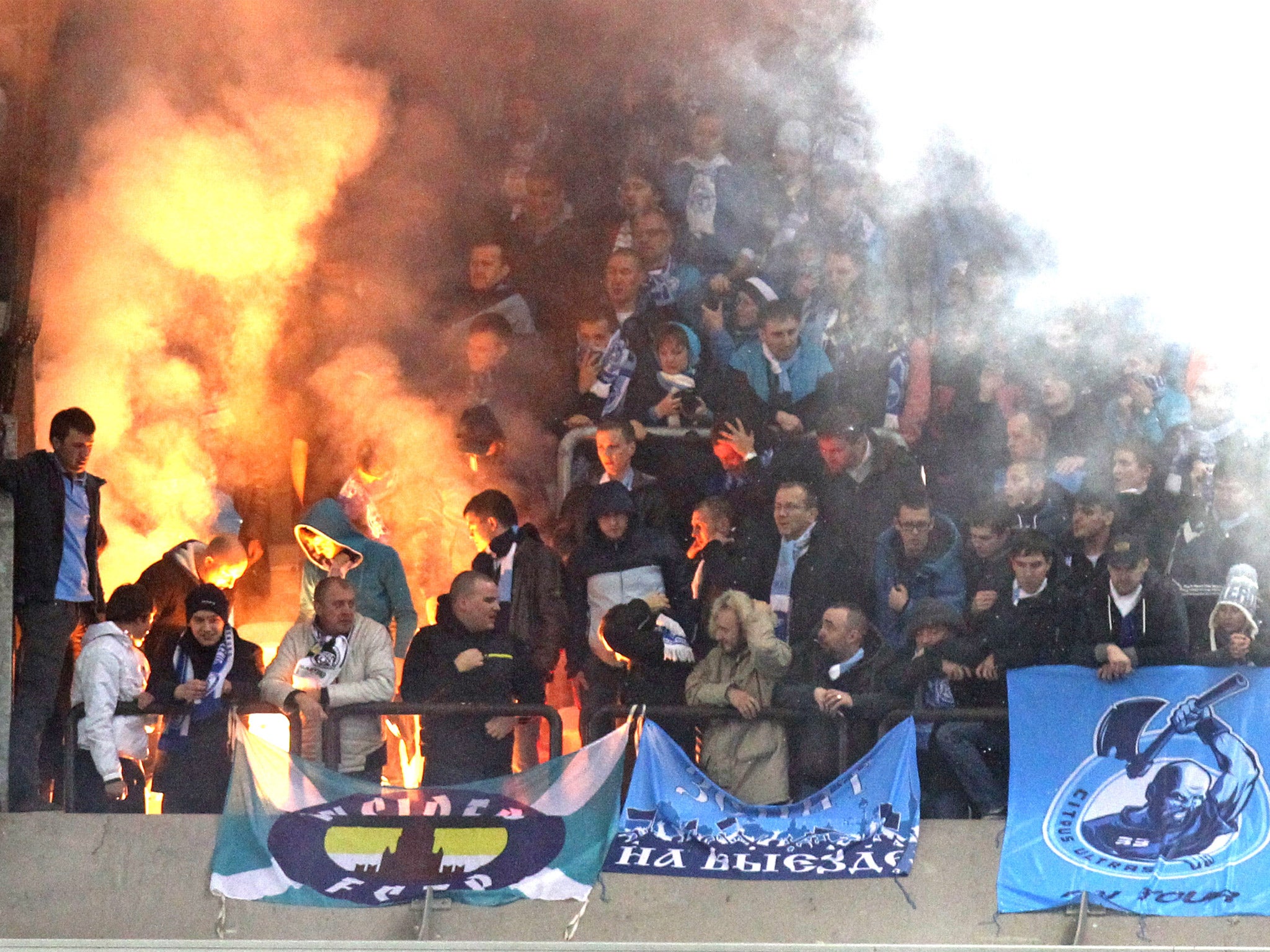 Zenit St Petersburg fans light flares during their Champions League group game against Anderlecht