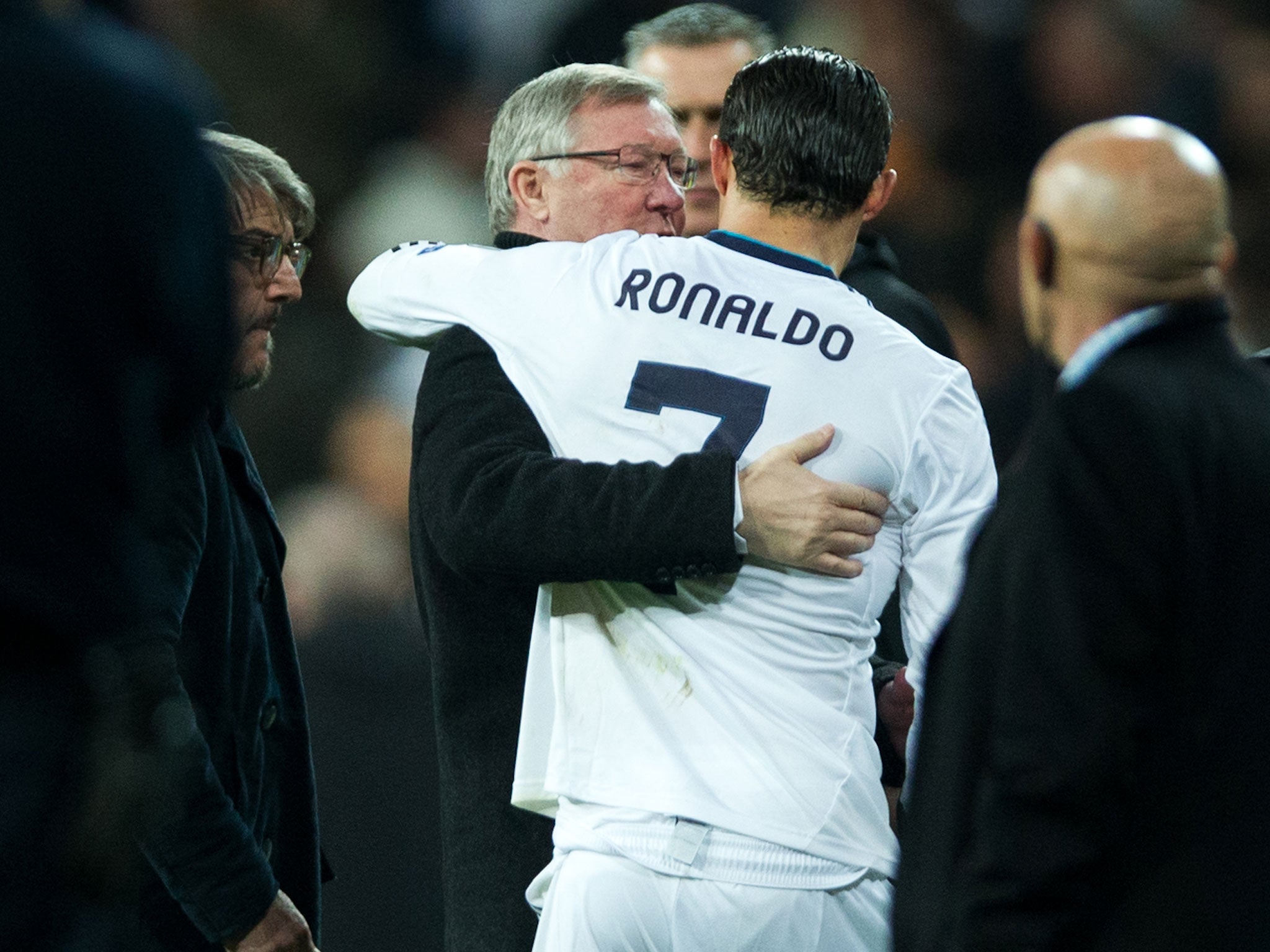Cristiano Ronaldo and Sir Alex Ferguson enjoy an embrace after the match between Real Mardid and Manchester United