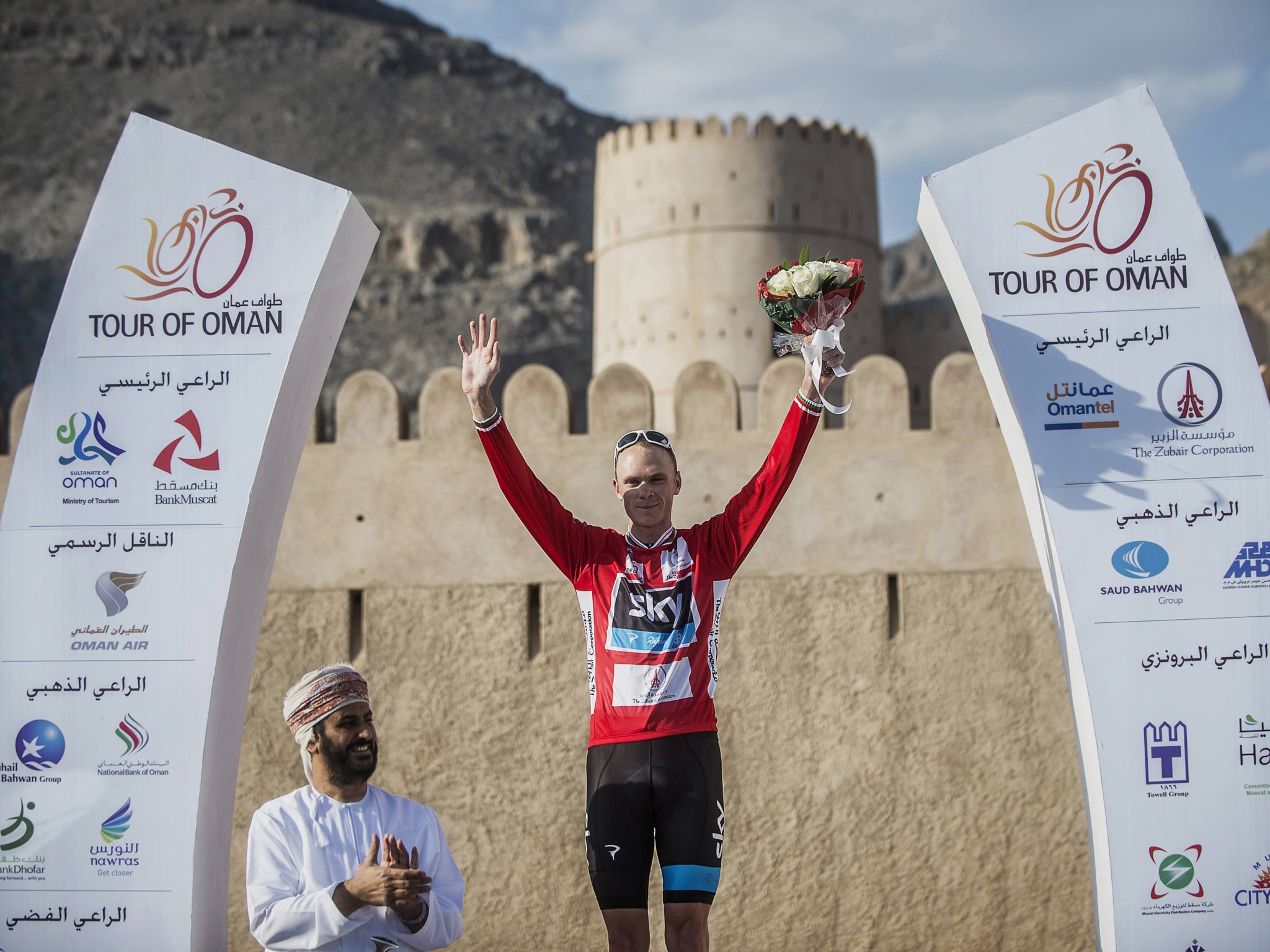 Chris Froome with the Tour of Oman leader's red jersey