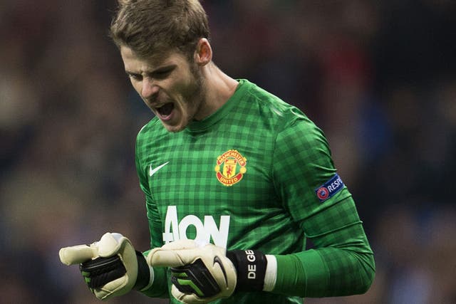 Manchester United goalkeeper David  de Gea celebrates at the end of Wednesday’s match at the Bernabeu 