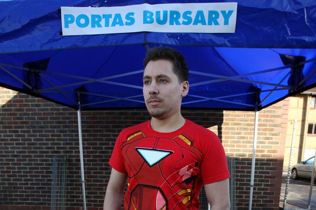 James Cobley, 26, a Portas Bursary recipient, pictured by his stall in Dartford Market