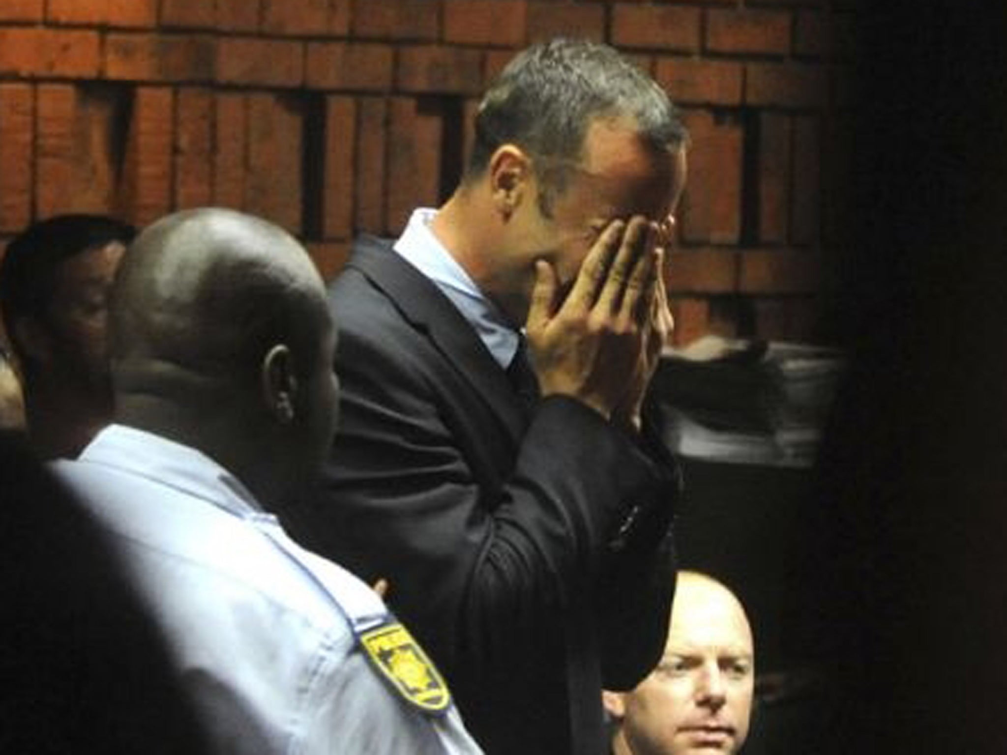 Athlete Oscar Pistorius weeps in court in Pretoria at his bail hearing in the murder case of his girlfriend Reeva Steenkamp