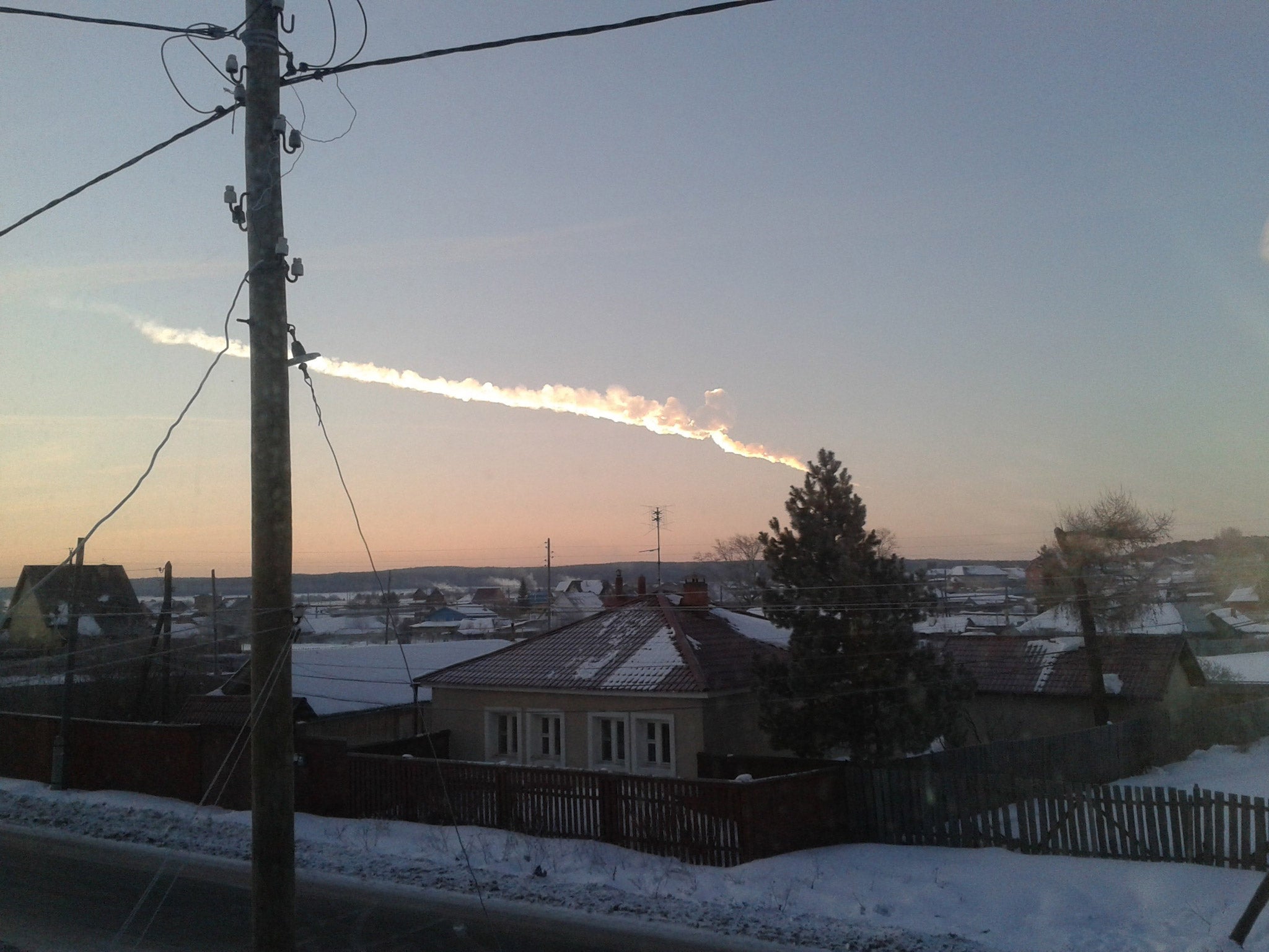 A meteor streaks across the sky of Russiaís Ural Mountains