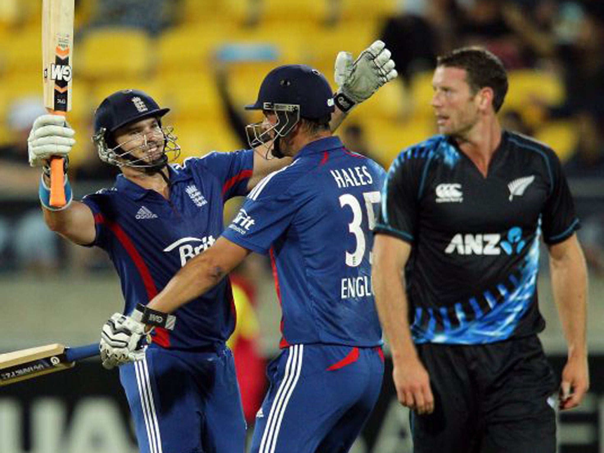 England’s Michael Lumb, left, and Alex Hales celebrate yesterday